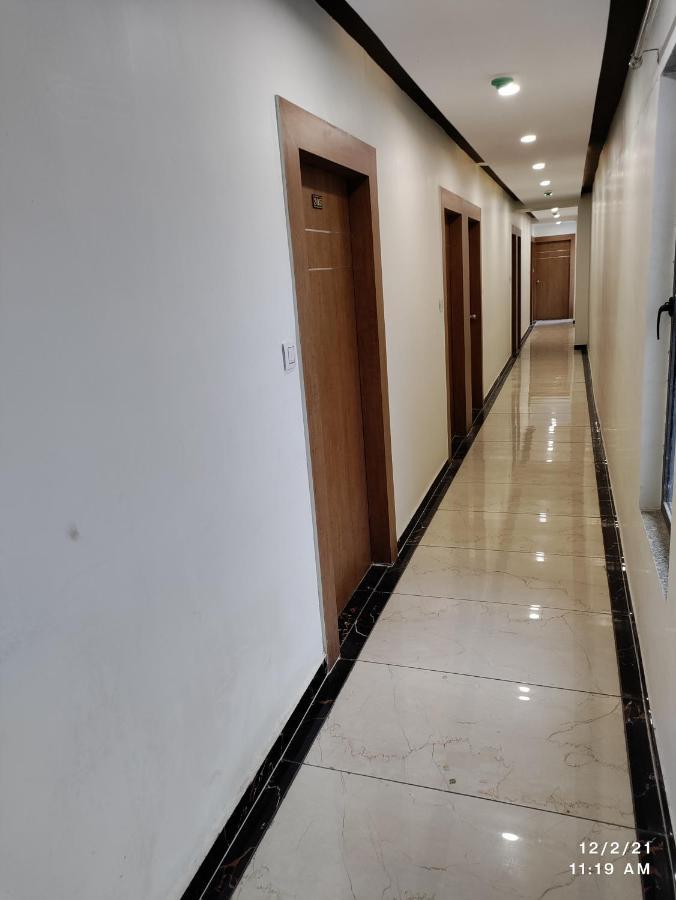 גנדהינאגר Hotel Asopalav מראה חיצוני תמונה