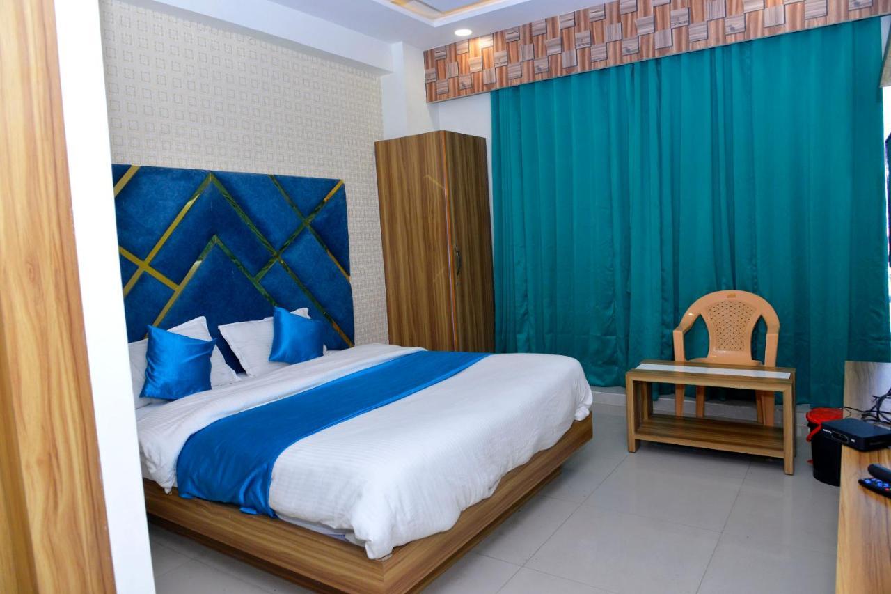 גנדהינאגר Hotel Asopalav מראה חיצוני תמונה