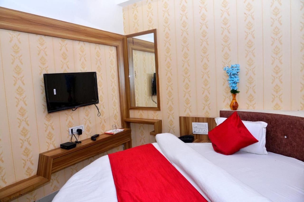 גנדהינאגר Hotel Asopalav מראה חיצוני תמונה