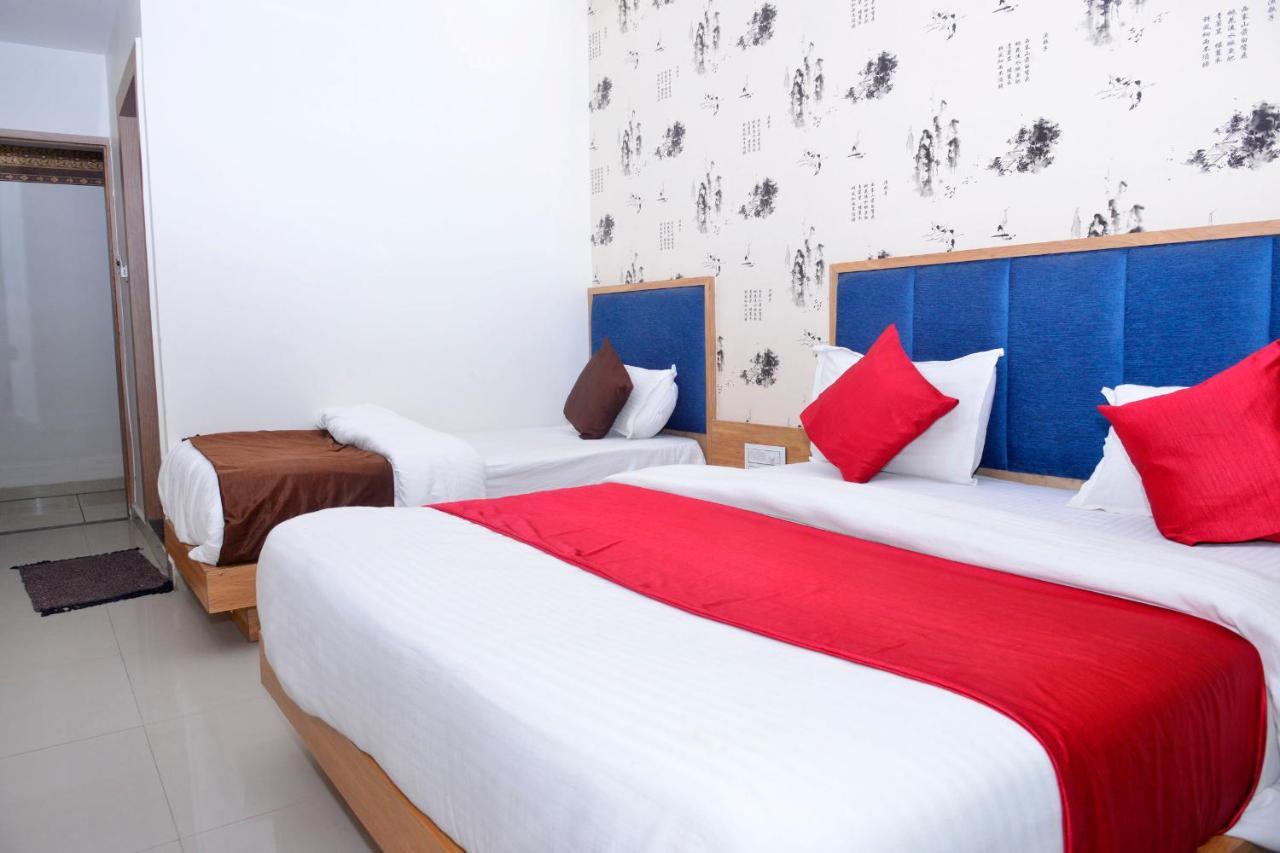 גנדהינאגר Hotel Asopalav מראה חיצוני תמונה
